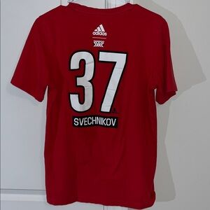NHL Carolina Hurricanes #37 Andrei Svechnikov Red Flags Logo Jersey shirt S